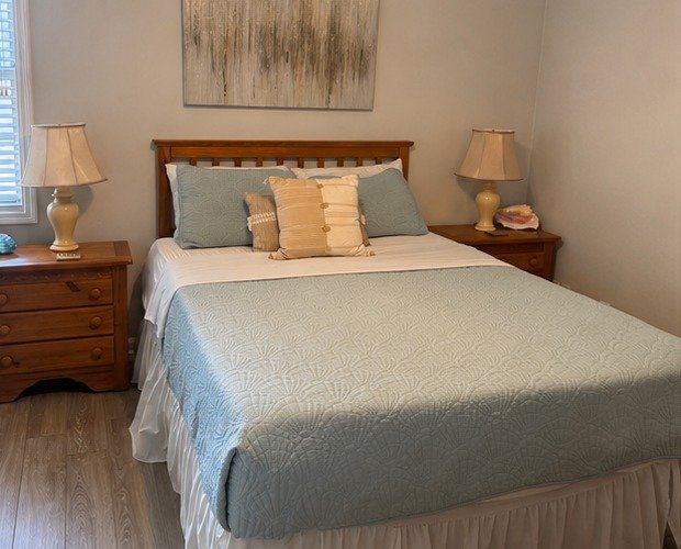 Freshly made guest bedroom